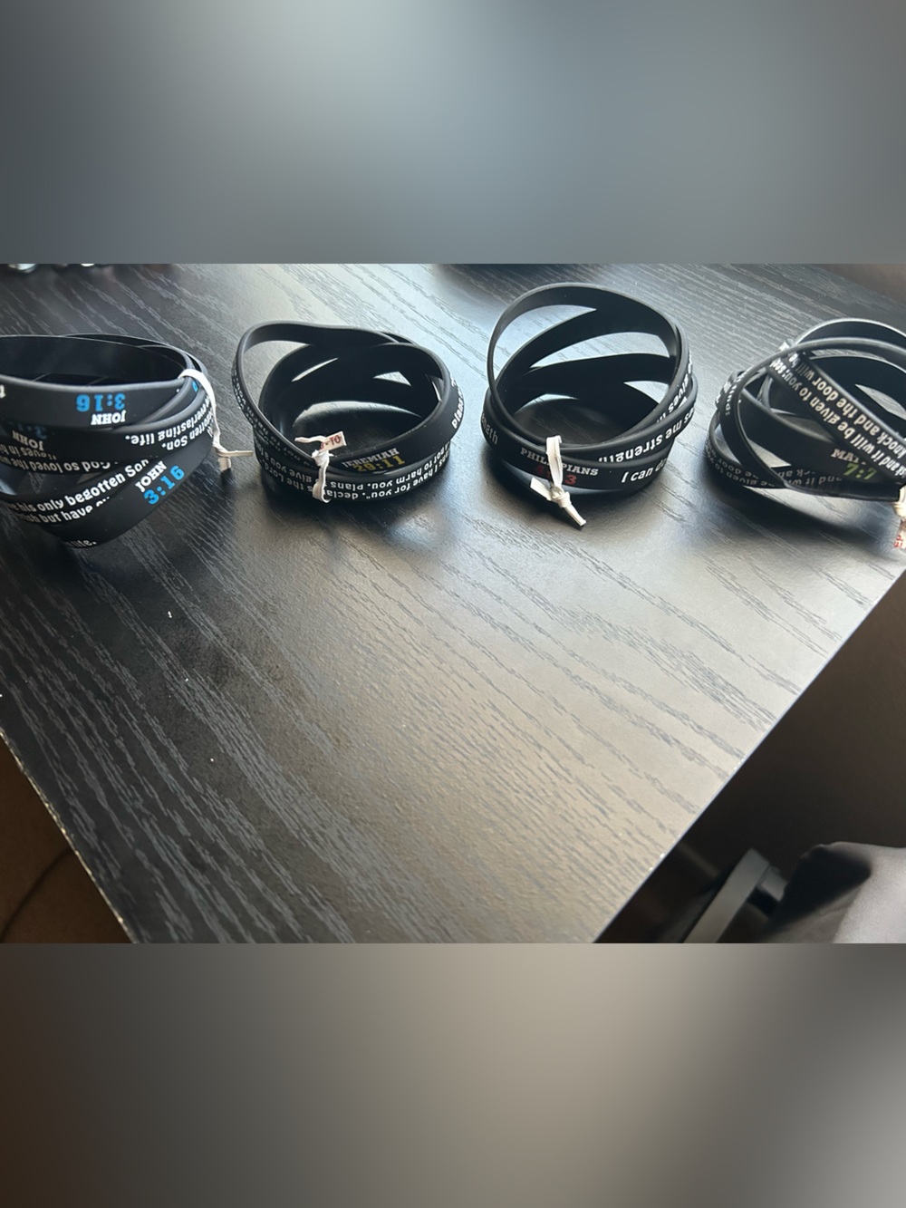 Amazon Black Silicone Inspirational Bible verse Bracelets 4 different verses.